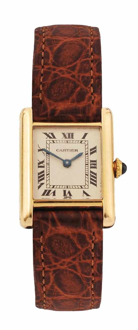 Appraisal: A LADIES CARTIER TANK GOLD WRISTWATCH Manual wind movement rectangular