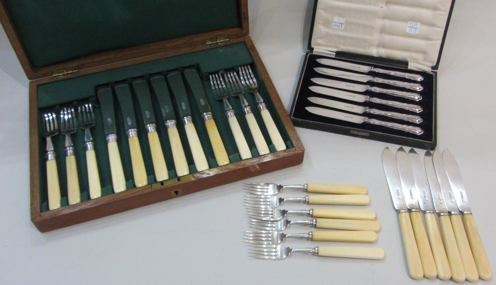 Appraisal: Six pairs of silver fish knives and forks with ivory