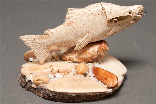 Appraisal: Continental carved bone trout with applied ivory decoration on whale