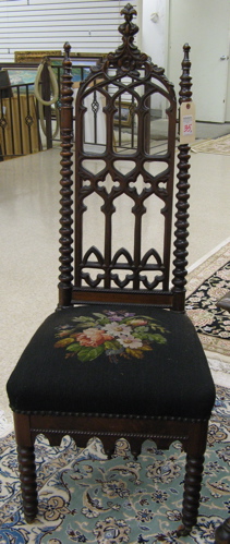 Appraisal: PAIR OF VICTORIAN MAHOGANY AND WALNUT HALL CHAIRS Gothic Revival