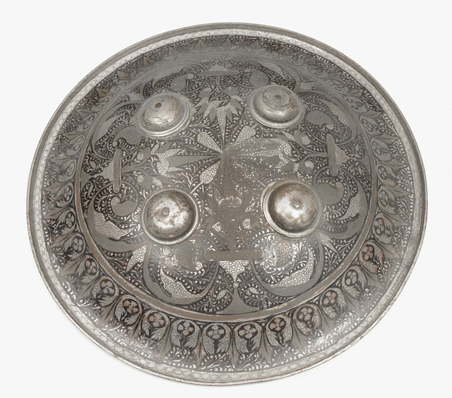 Appraisal: AN ANTIQUE INDIAN CIRCULAR STEEL SHIELD with foliate engraved decoration