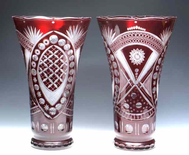 Appraisal: A PAIR OF RUBY FLASH GLASS VASES of flaring form