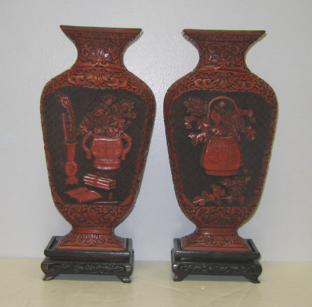 Appraisal: PAIR CINNABAR VASES Of flattened pillow form elaborately decorated with