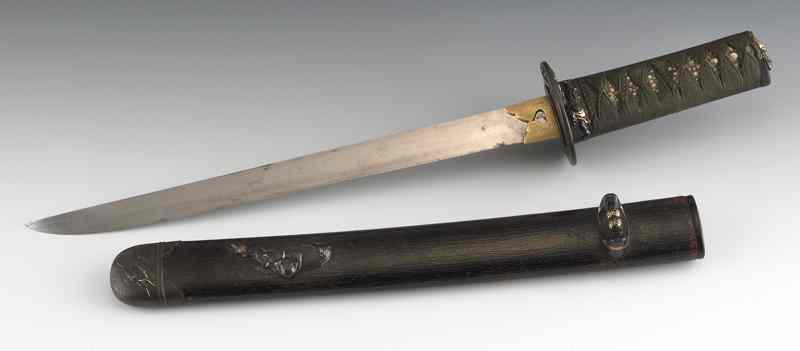 Appraisal: Japanese Wakazashi Samurai sword with a lacquered sheath sharkskin scabbard