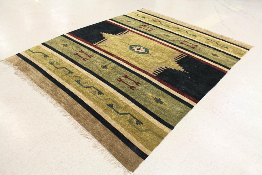 Appraisal: A CONTEMPORARY FLATWEAVE RUG tribal design ' x '