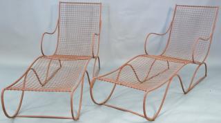 Appraisal: Pair of French wrought iron chaise lounges painted in brick