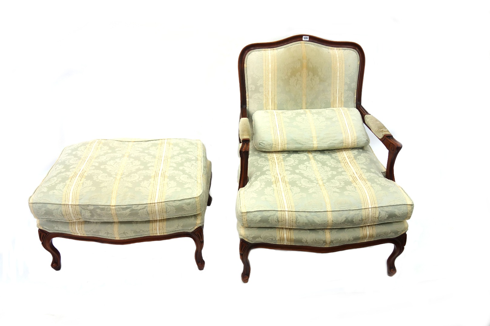 Appraisal: A reproduction Louis XV style fauteuil and footstool upholstered in