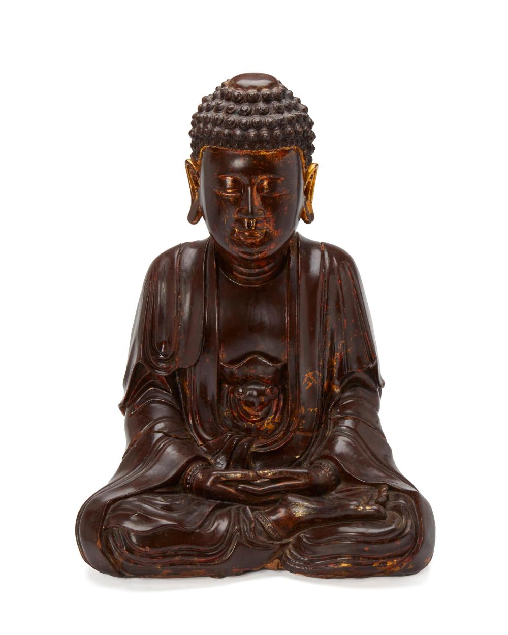 Appraisal: A CHINESE CARVED WOOD BUDDHAA Chinese carved wood Buddha th