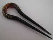 Appraisal: A tortoiseshell hair ornament with yellow metal inlay approx cm