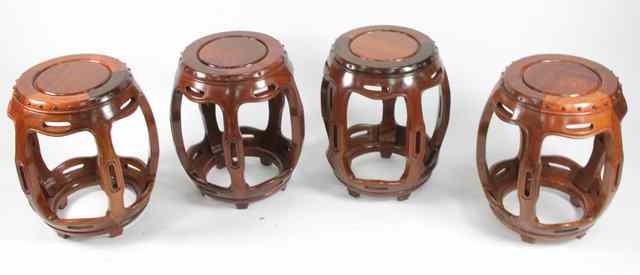 Appraisal: A set of four Siam Furniture Co Ltd hardwood barrel