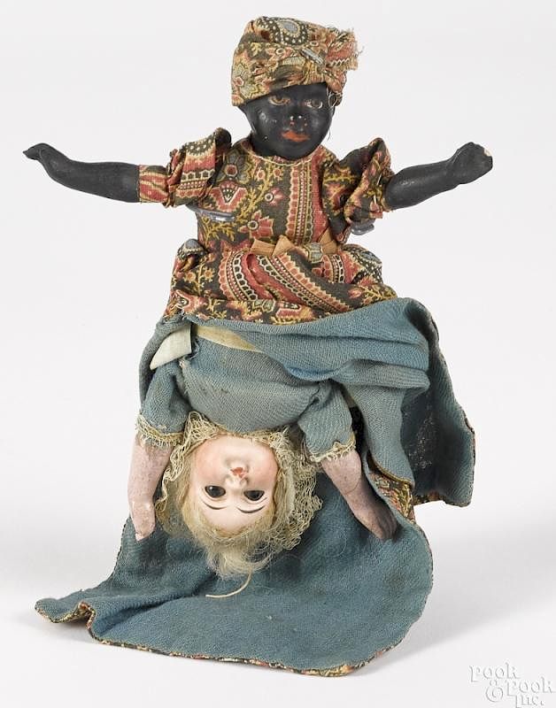 Appraisal: Composition Black Americana topsy-turvy doll Composition Black Americana topsy-turvy doll