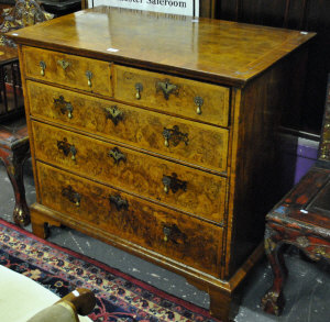 Appraisal: A Queen Anne walnut and burr chest of two short