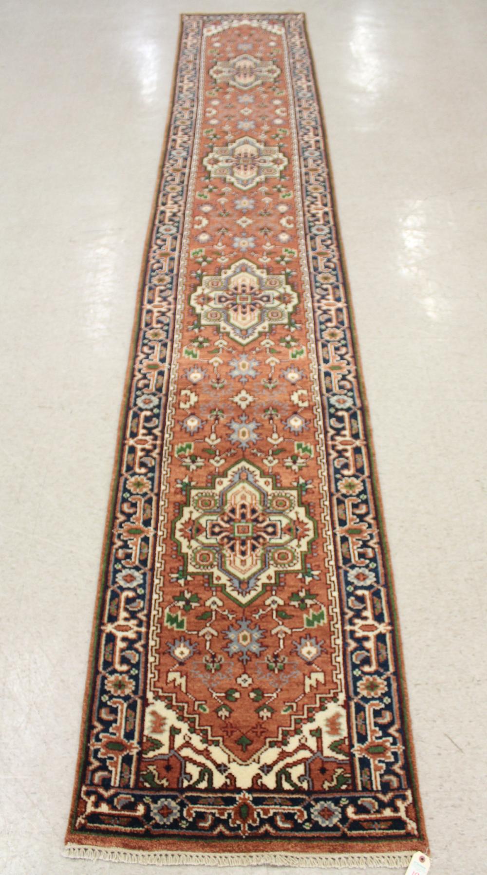 Appraisal: HAND KNOTTED ORIENTAL RUNNER Persian Serab design of stylized flowers