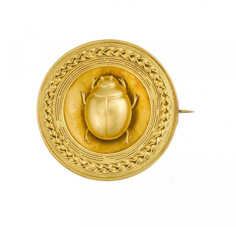 Appraisal: A VICTORIAN GOLD ARCHEOLOGICAL STYLE BROOCH BY JOHN BROGDEN applied