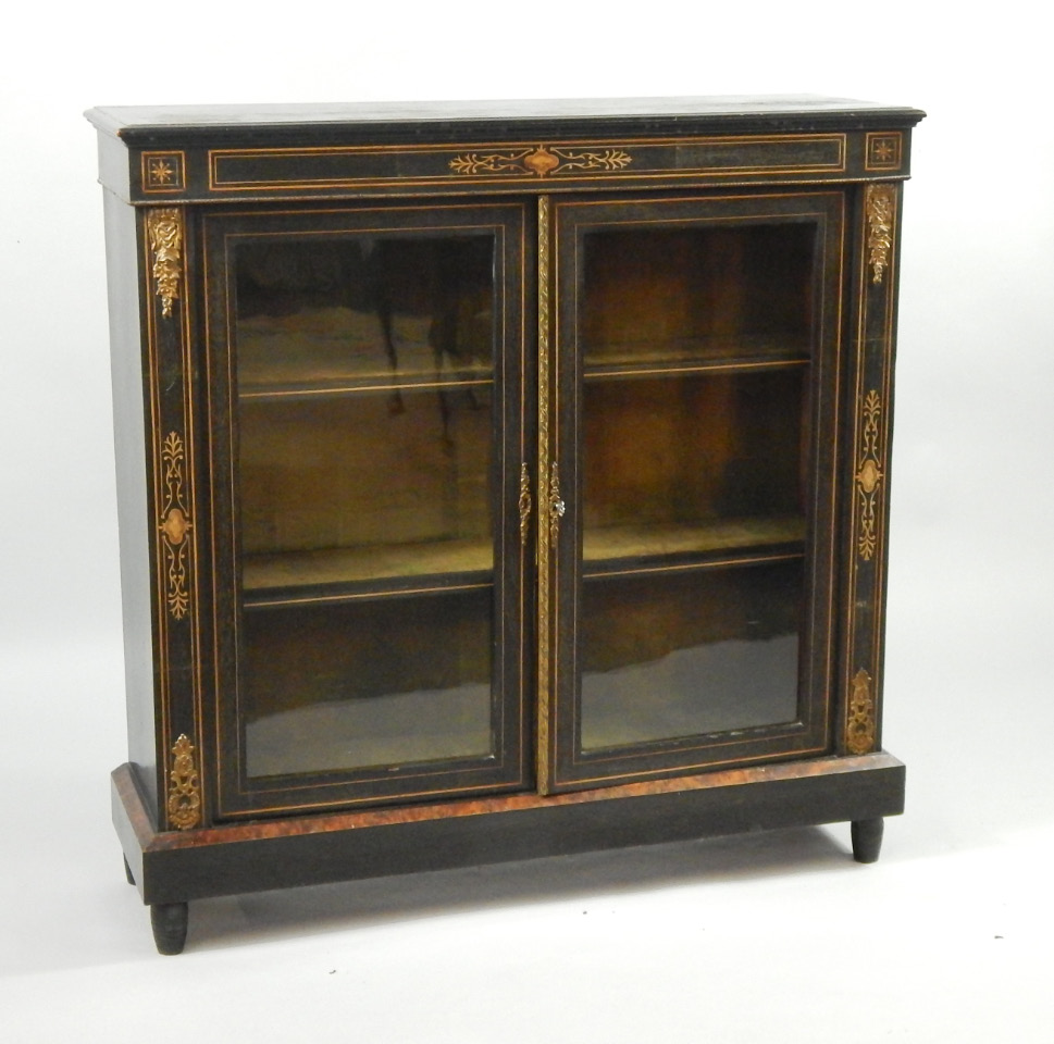 Appraisal: A Victorian ebonised mahogany pier cabinet with brass mounts satinwood