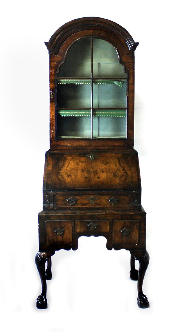 Appraisal: A small figured walnut bureau bookcase of Queen Anne design