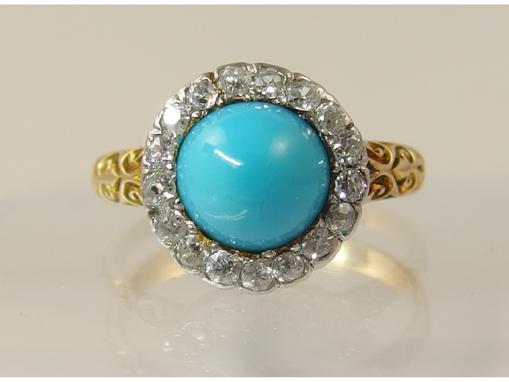 Appraisal: An ct turquoise and diamond ringthe high turquoise cabouchon is