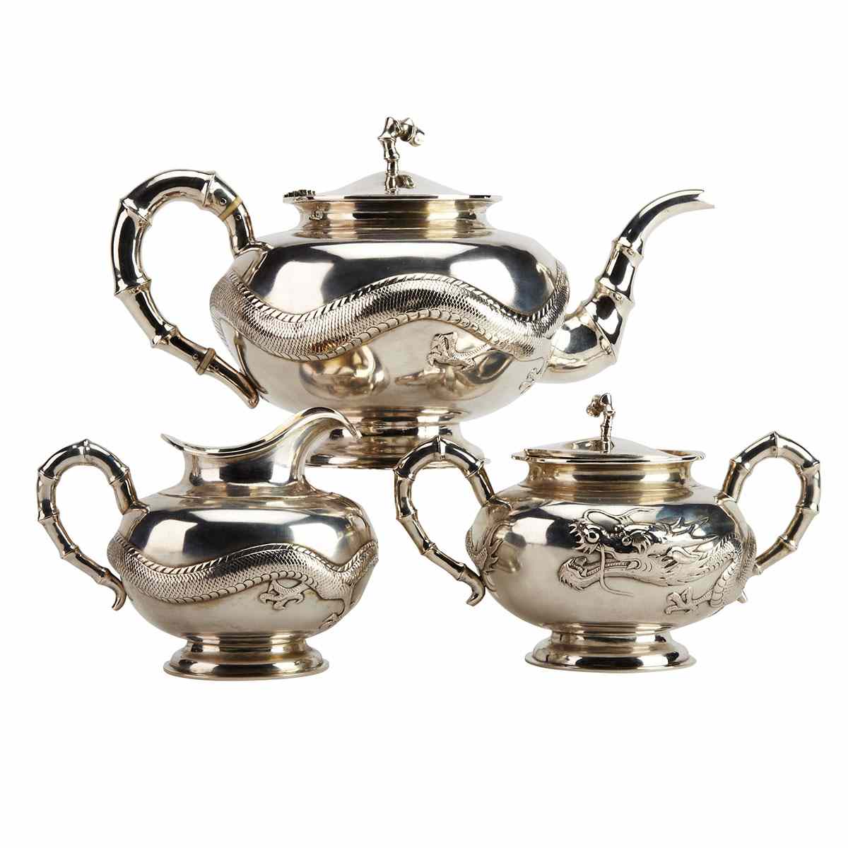 Appraisal: Export Silver Three Piece Tea Set Includes a creamer sugar