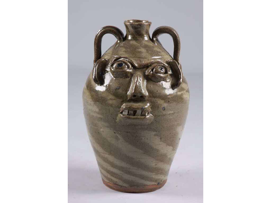 Appraisal: NC Folk Pottery Face Jug Burlon Craig four gallon swirlware