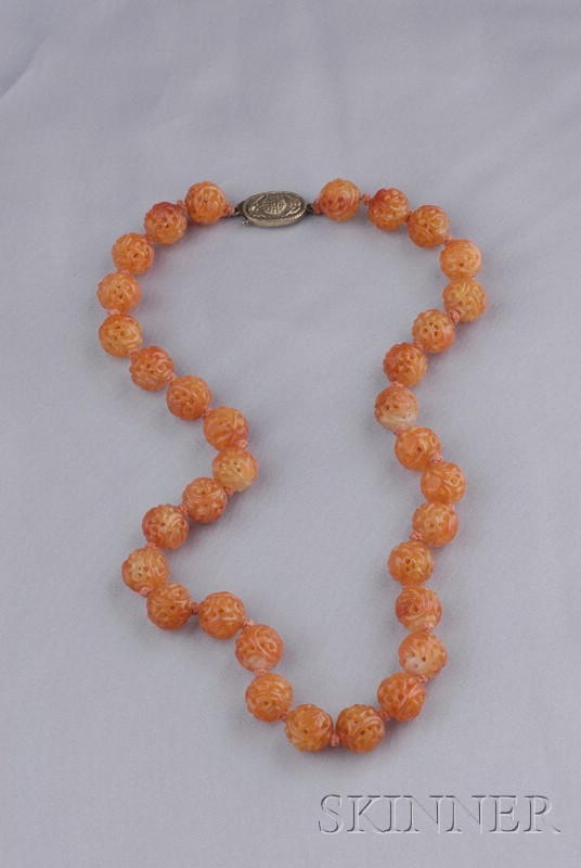 Appraisal: Carnelian Bead Necklace composed of thirty-three carved beads each measuring