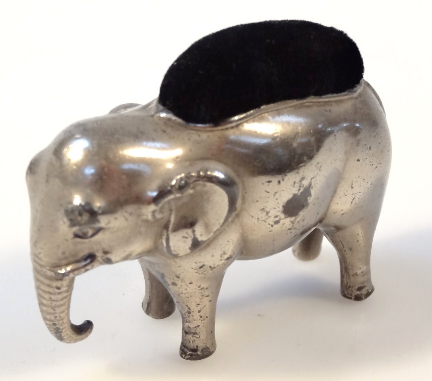 Appraisal: An early thC silver plated pin cushion in the form