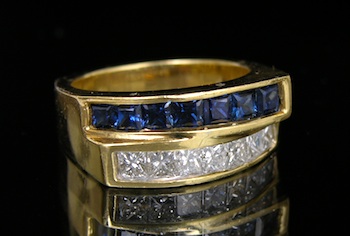 Appraisal: Elegant Diamond and Sapphire Ring k yellow gold ring features