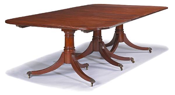 Appraisal: A Regency style mahogany three pedestal banquet table Comprising two