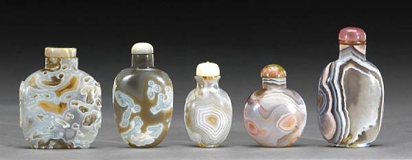 Appraisal: A group of five macaroni agate snuff bottles Including one