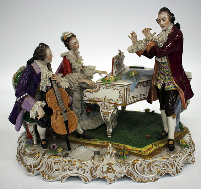 Appraisal: A CONTINENTAL PORCELAIN GROUP OF THREE MUSICIANS in th century