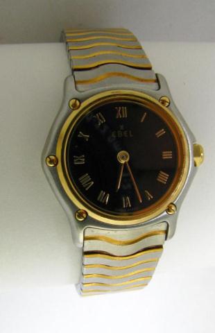 Appraisal: Ebel lady's stainless and K yellow gold sport wave wristwatch