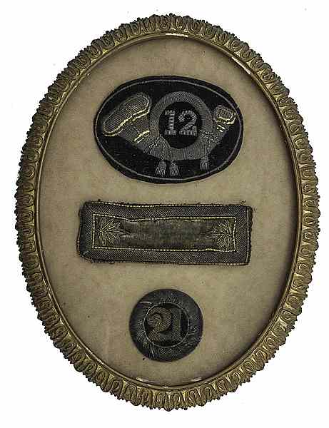 Appraisal: Framed Bullion Hat Emblem Shoulder Strap Unit Insignia Brevet Major