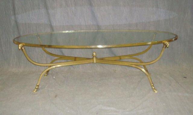 Appraisal: Polished Brass Ram Headed Glass Top Coffee Table From a