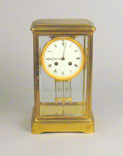 Appraisal: French brass and beveled glass mantel clock early th century