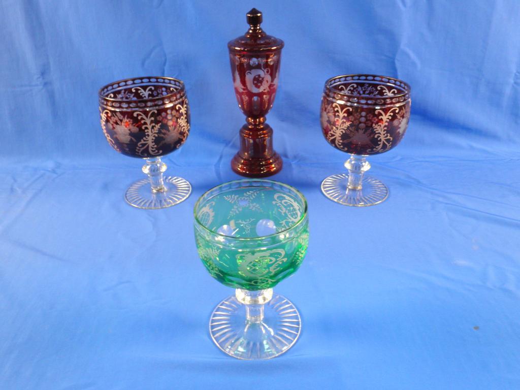 Appraisal: A Bohemian type ruby tinted cut glass vase and cover