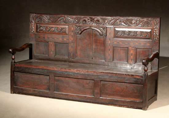 Appraisal: Jacobean Style Carved Oak Settle Partially Composed of th Century