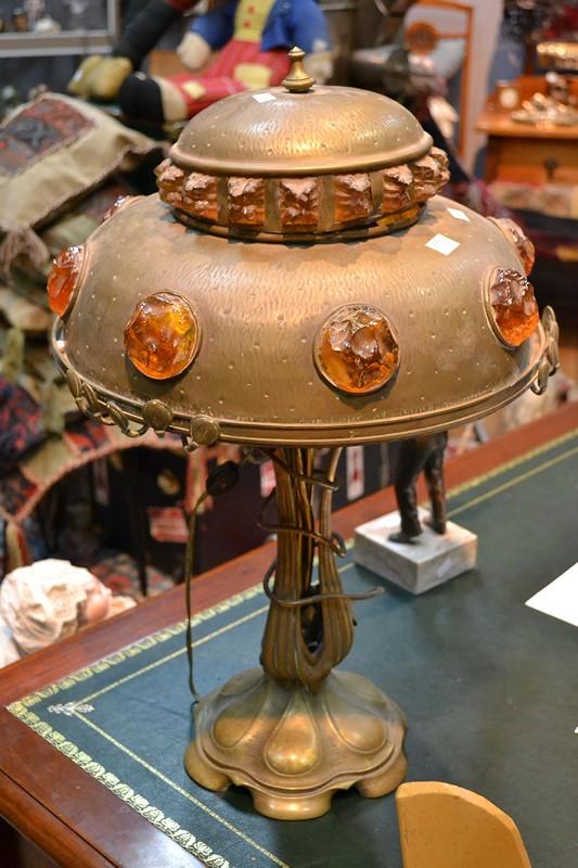 Appraisal: AN UNUSUAL AUSTRIAN ART NOUVEAU BRASS AND AMBER GLASS LAMP