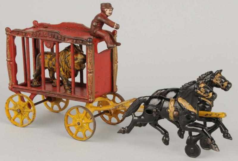 Appraisal: Cast Iron Royal Circus Lion Cage Wagon Toy Description With