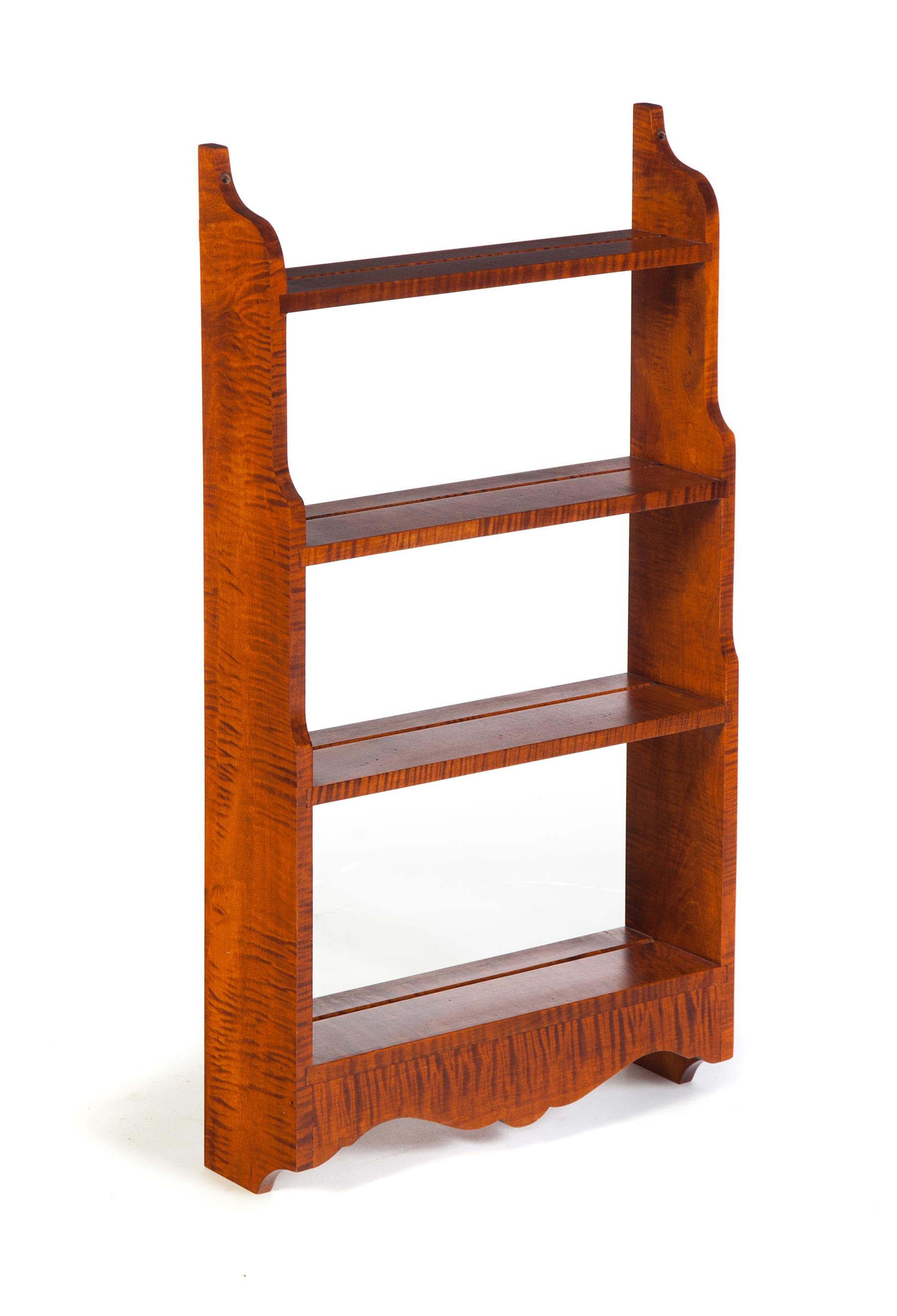 Appraisal: TIGER MAPLE HANGING SHELF American late th century Four shelves