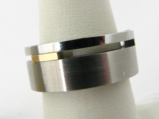 Appraisal: New K yellow gold and sterling silver gentleman's ring finger