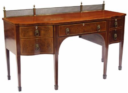 Appraisal: A George III mahogany and inlaid sideboard of serpentine breakfront