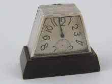 Appraisal: A silver and bakelite Art Deco miniature clock with eight