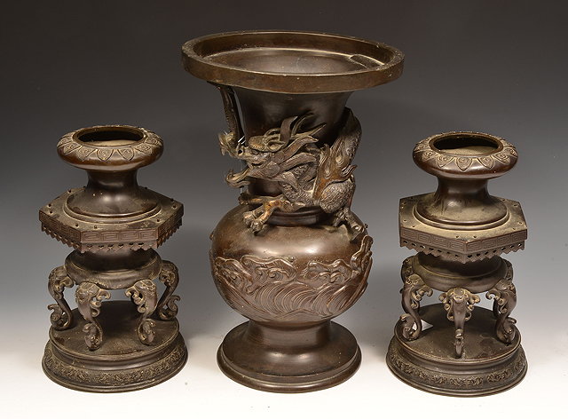 Appraisal: A JAPANESE BRONZE BALUSTER VASE with mythical creature ornamentation cm