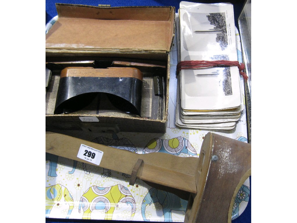 Appraisal: Lot comprising two stereoscopes with slides