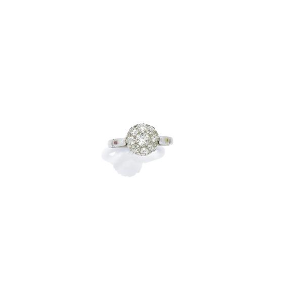 Appraisal: A DIAMOND RING France circa Platinum Decorative ring the cluster