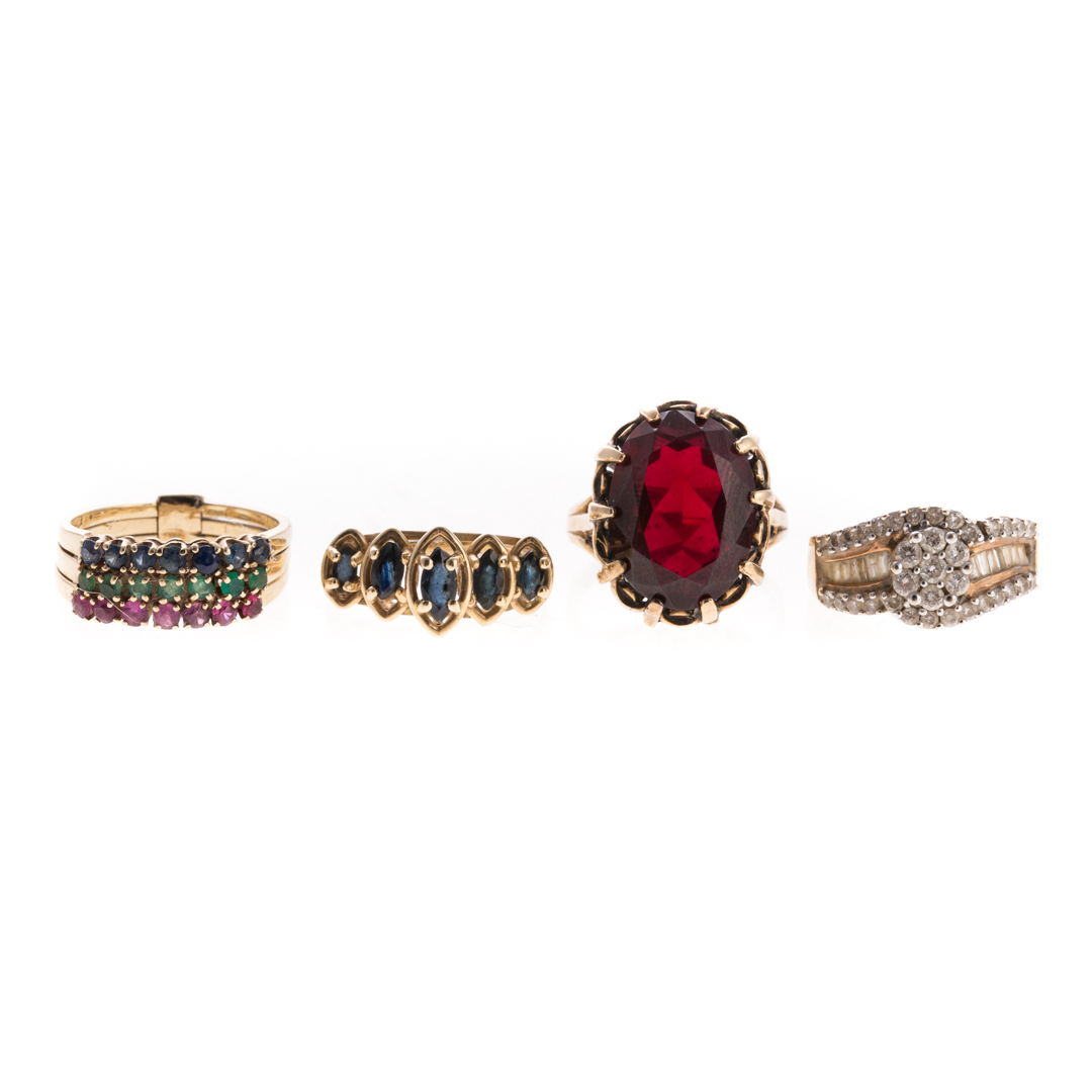 Appraisal: Four Lady's Gemstone Rings in Gold K yellow gold band