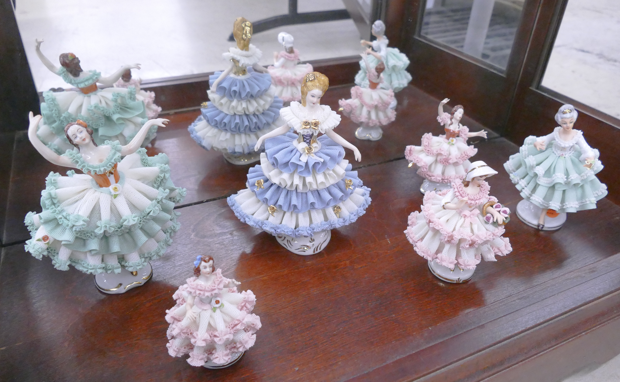 Appraisal: pc German Porcelain Latis Dress Figurines- '' to ''