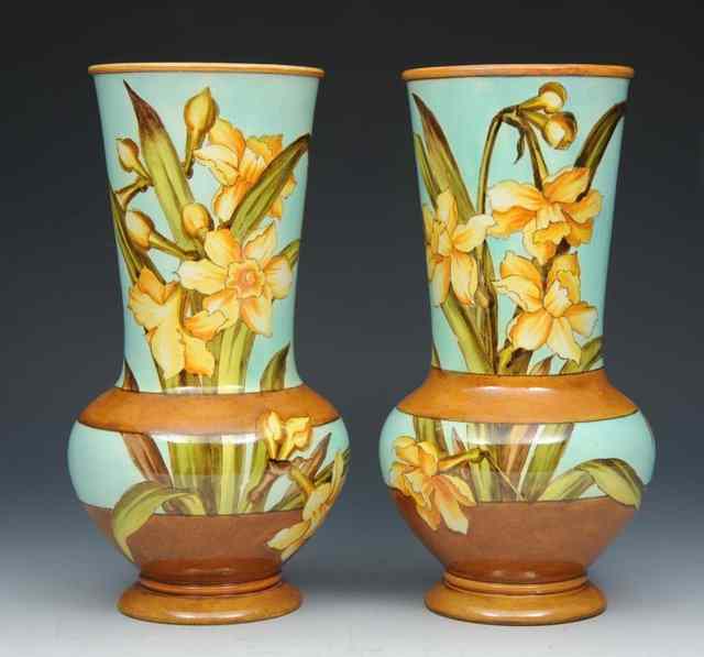 Appraisal: A PAIR OF DOULTON LAMBETH TURQUOISE GROUND TAPERING VASES each