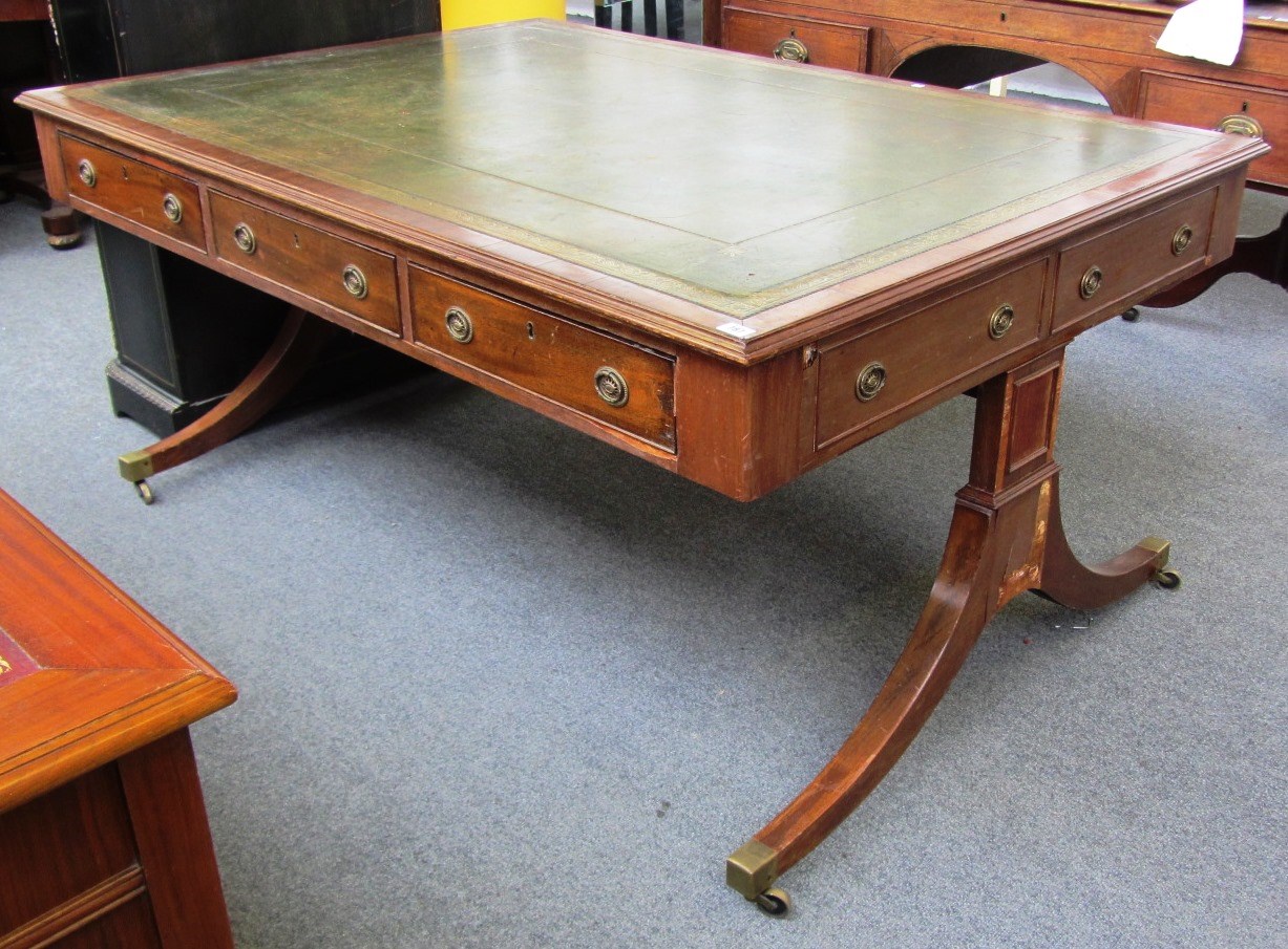 Appraisal: A George III style rectangular centre writing table on trestle