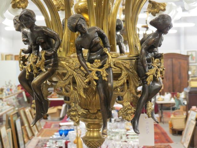 Appraisal: Brass and Bronze Chandelier light seated maidens and florals frosted