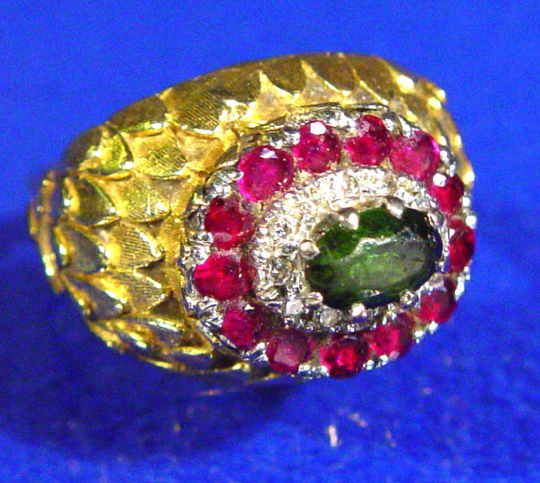 Appraisal: Gold diamond ruby and emerald ring